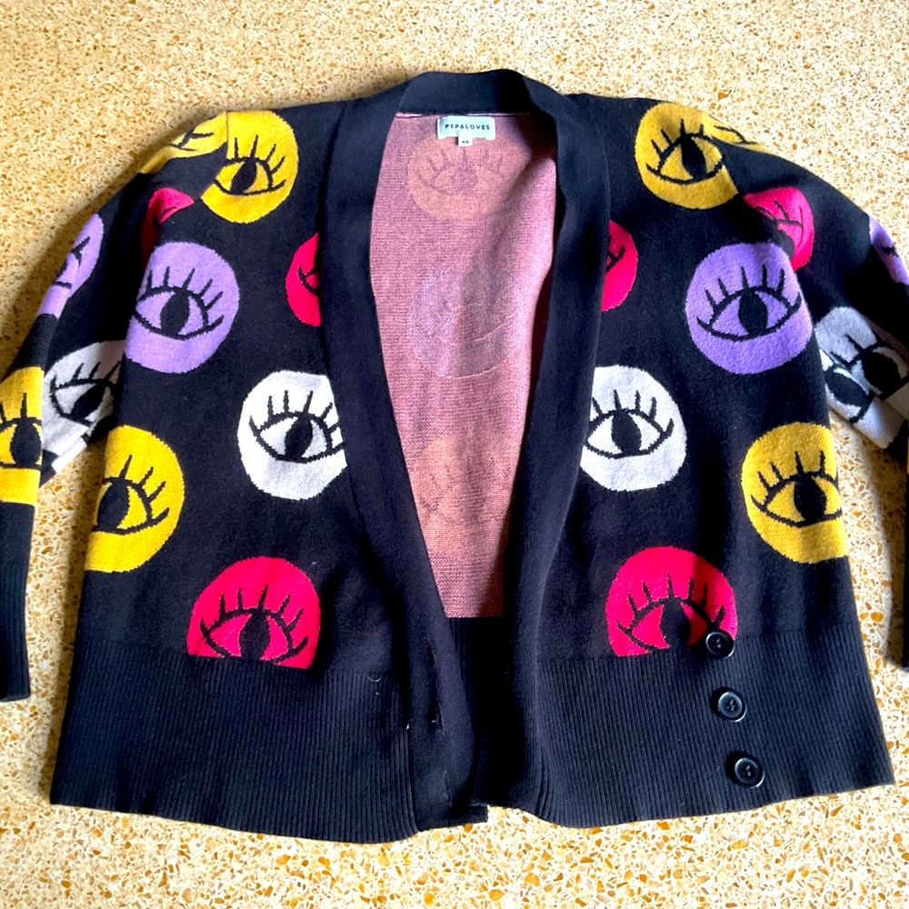 Eye design cardigan from Spain